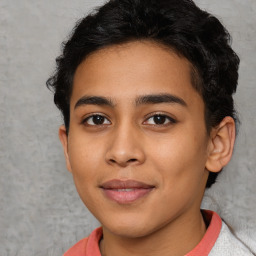 Joyful latino young-adult male with short  brown hair and brown eyes