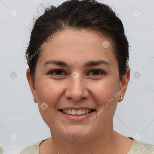 Joyful white young-adult female with short  brown hair and brown eyes