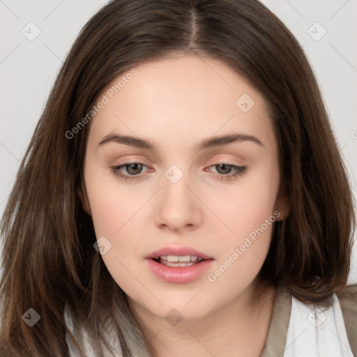 Neutral white young-adult female with long  brown hair and brown eyes