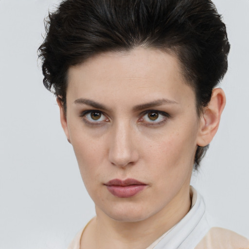 Neutral white young-adult female with short  brown hair and brown eyes