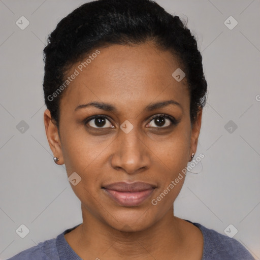 Joyful black young-adult female with short  black hair and brown eyes