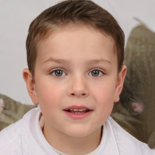 Joyful white child female with short  brown hair and brown eyes