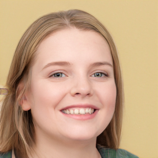 Joyful white young-adult female with long  brown hair and blue eyes