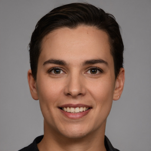 Joyful white young-adult female with short  brown hair and brown eyes