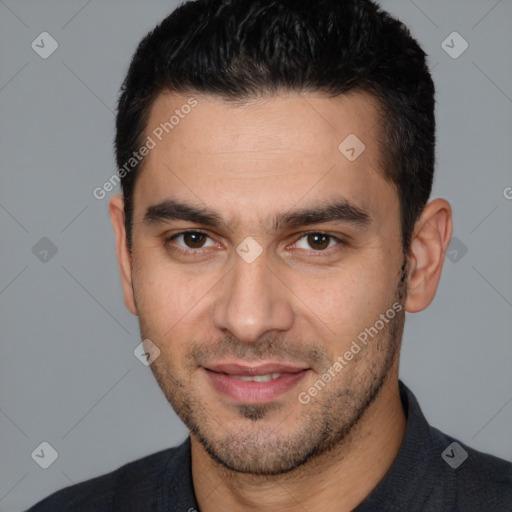 Joyful white young-adult male with short  brown hair and brown eyes