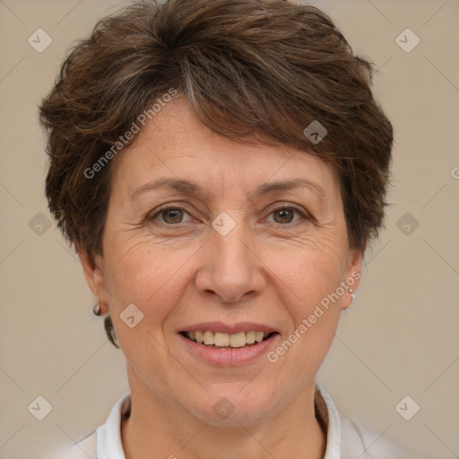 Joyful white adult female with short  brown hair and brown eyes