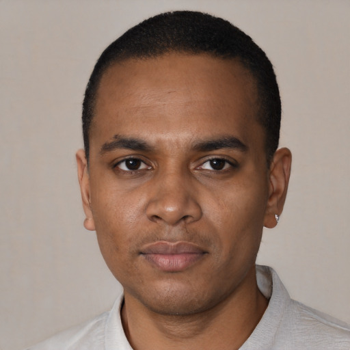 Neutral black young-adult male with short  black hair and brown eyes