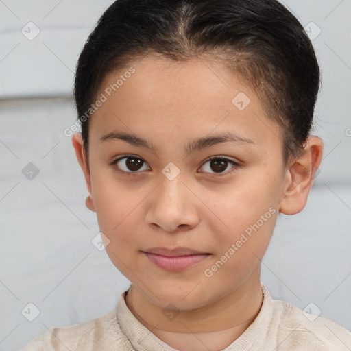 Joyful white child female with short  brown hair and brown eyes