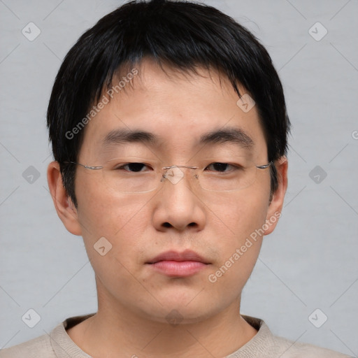 Neutral asian young-adult male with short  brown hair and brown eyes