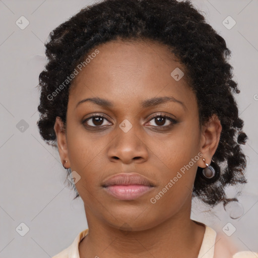 Neutral black young-adult female with medium  brown hair and brown eyes