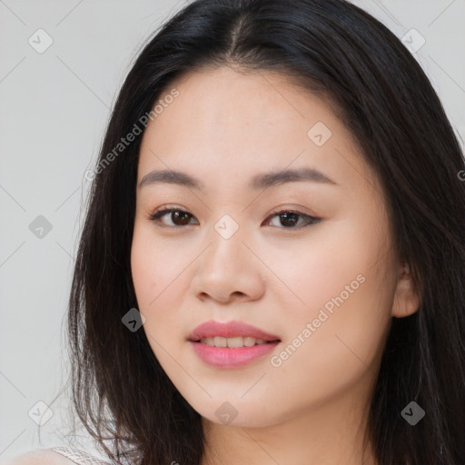 Joyful asian young-adult female with long  brown hair and brown eyes