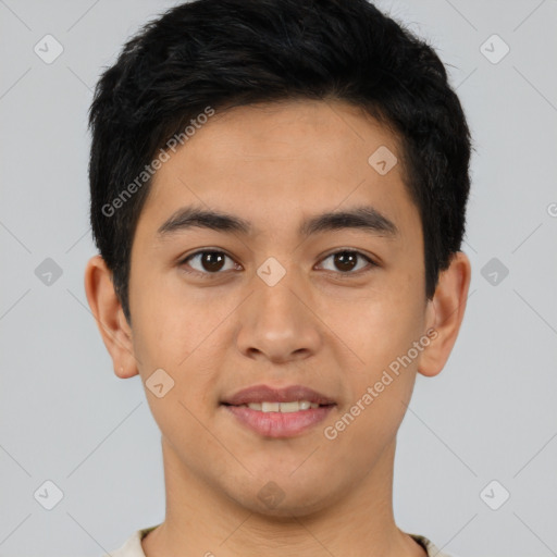 Joyful asian young-adult male with short  black hair and brown eyes