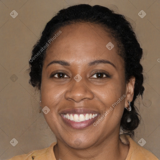 Joyful latino adult female with long  brown hair and brown eyes