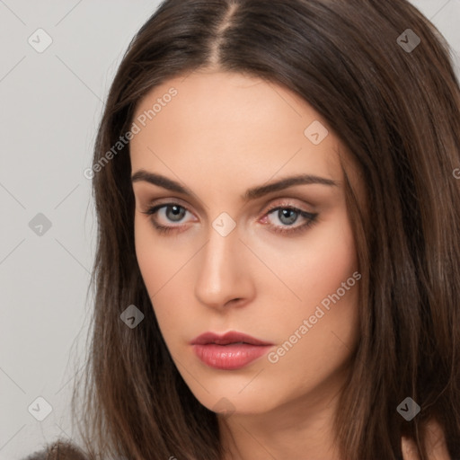 Neutral white young-adult female with long  brown hair and brown eyes