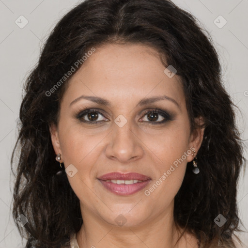 Joyful white adult female with long  brown hair and brown eyes