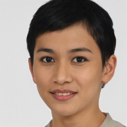 Joyful asian young-adult female with short  black hair and brown eyes