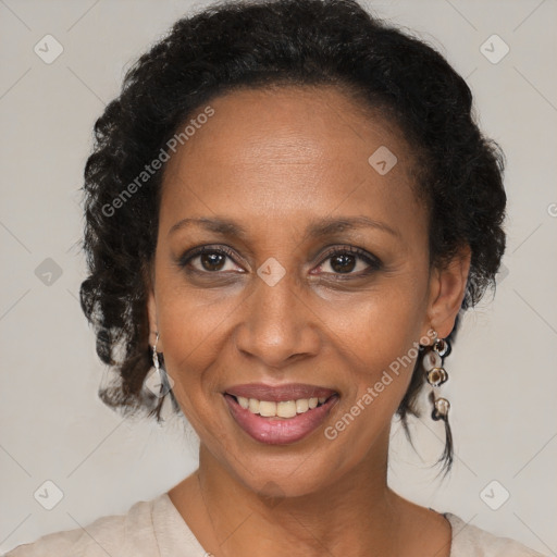 Joyful black adult female with medium  brown hair and brown eyes