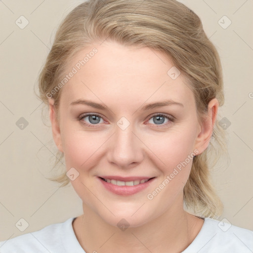 Joyful white young-adult female with medium  brown hair and blue eyes