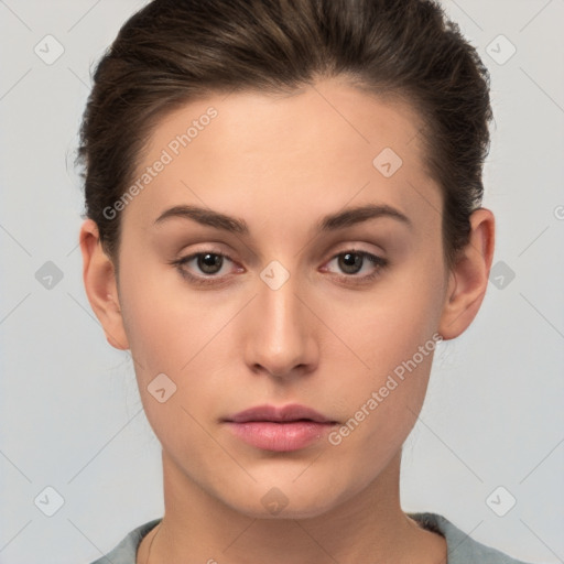 Neutral white young-adult female with short  brown hair and brown eyes