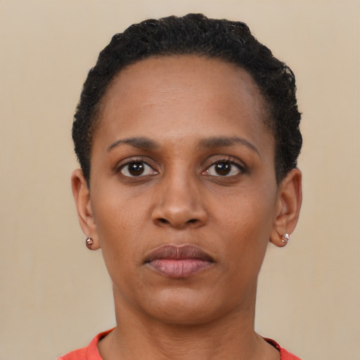 Neutral black young-adult female with short  black hair and brown eyes