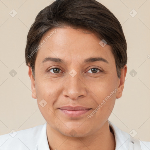 Joyful white adult female with short  brown hair and brown eyes