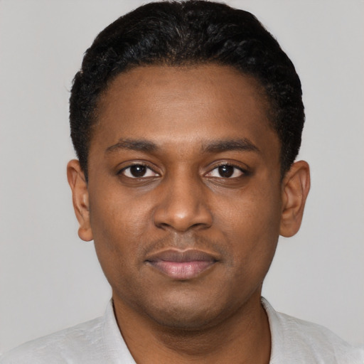 Neutral black young-adult male with short  black hair and brown eyes