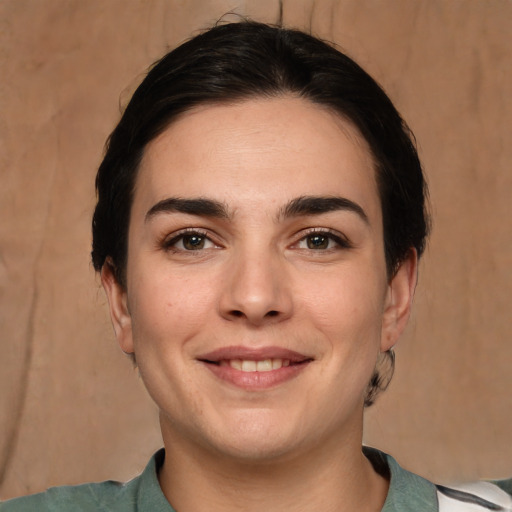 Joyful white young-adult female with medium  brown hair and brown eyes