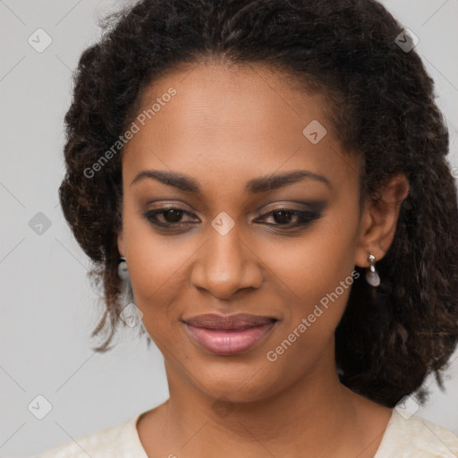 Joyful black young-adult female with medium  brown hair and brown eyes