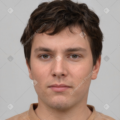 Neutral white young-adult male with short  brown hair and grey eyes