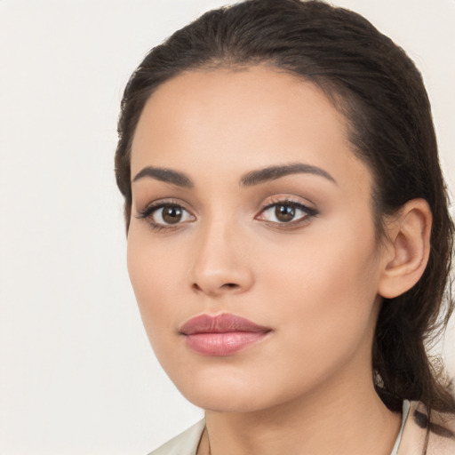 Neutral white young-adult female with medium  brown hair and brown eyes