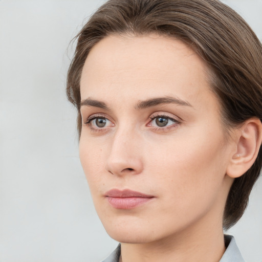 Neutral white young-adult female with medium  brown hair and grey eyes