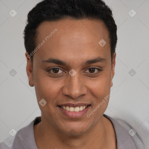 Joyful latino young-adult male with short  brown hair and brown eyes