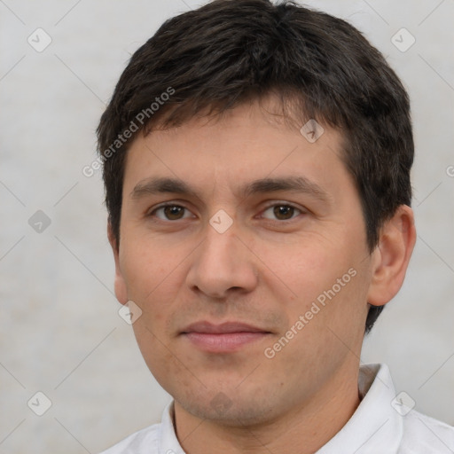 Joyful white young-adult male with short  brown hair and brown eyes