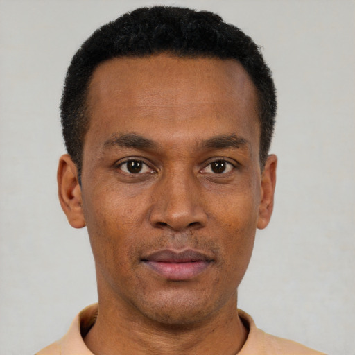 Neutral black young-adult male with short  black hair and brown eyes