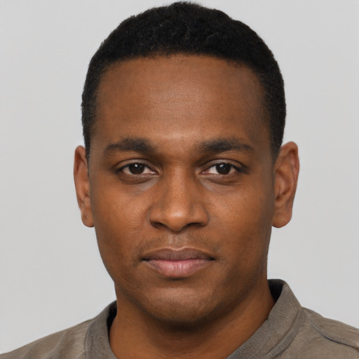 Neutral black young-adult male with short  black hair and brown eyes