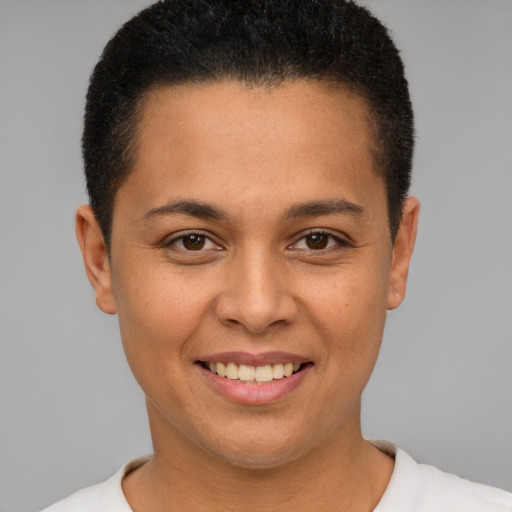 Joyful white young-adult female with short  brown hair and brown eyes