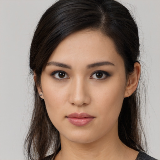 Neutral asian young-adult female with long  brown hair and brown eyes