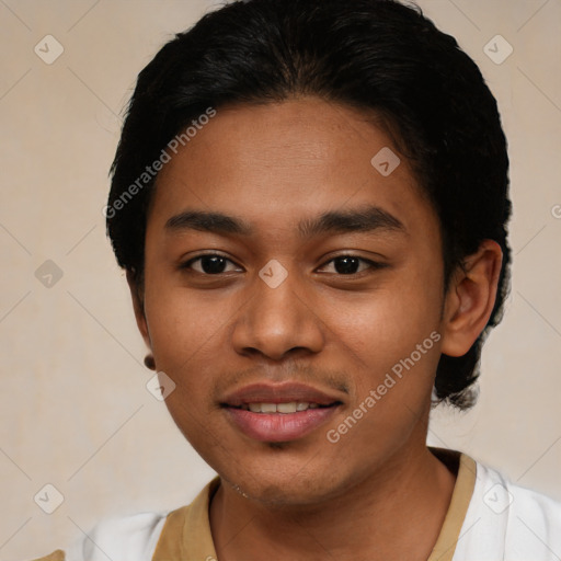 Joyful latino young-adult male with short  black hair and brown eyes