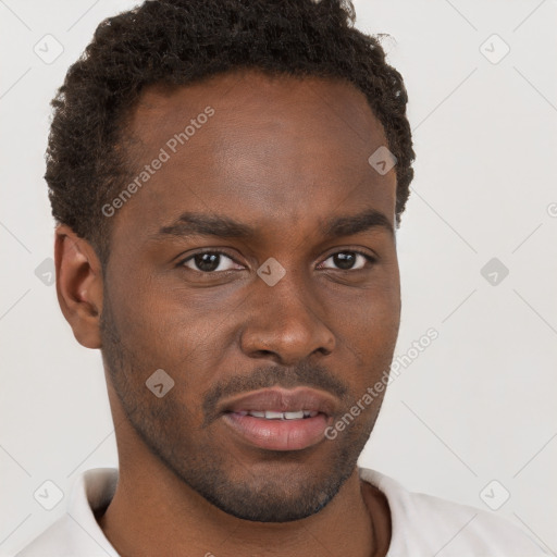 Neutral black young-adult male with short  brown hair and brown eyes