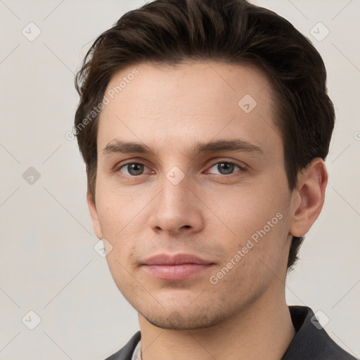 Neutral white young-adult male with short  brown hair and grey eyes