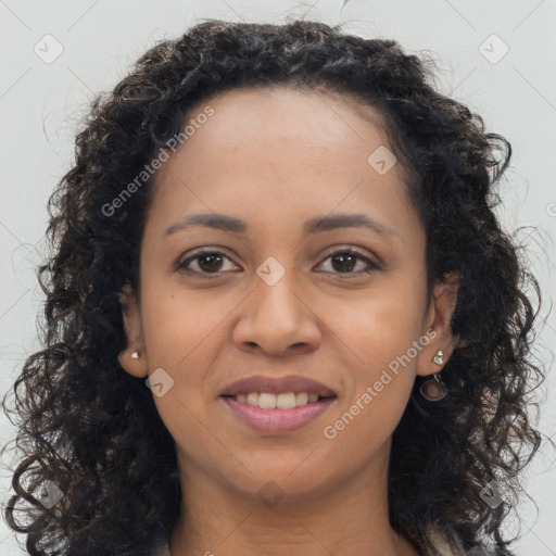 Joyful latino young-adult female with long  brown hair and brown eyes