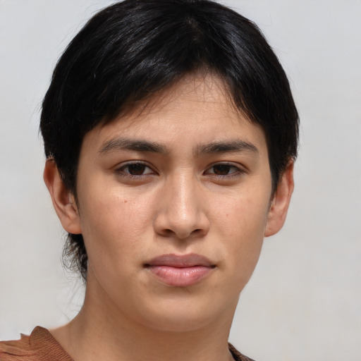Joyful asian young-adult female with short  brown hair and brown eyes