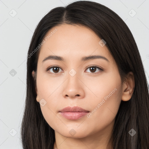 Neutral latino young-adult female with long  brown hair and brown eyes