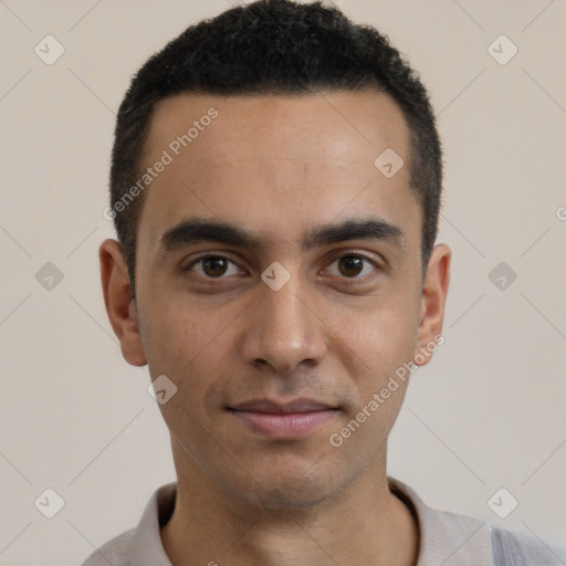 Joyful white young-adult male with short  black hair and brown eyes