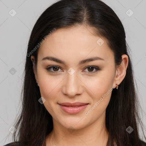 Joyful latino young-adult female with long  brown hair and brown eyes