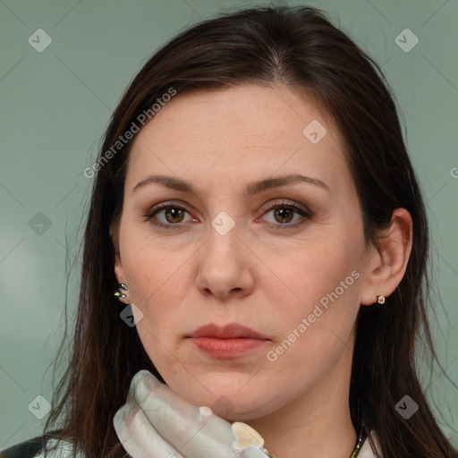 Joyful white adult female with long  brown hair and brown eyes