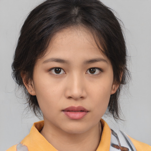 Neutral asian young-adult female with medium  brown hair and brown eyes