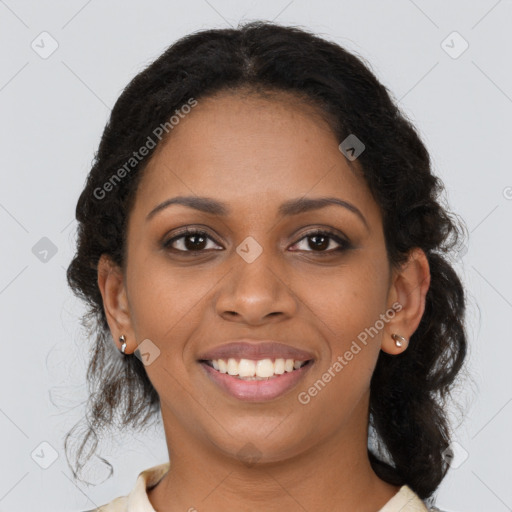 Joyful black young-adult female with medium  brown hair and brown eyes