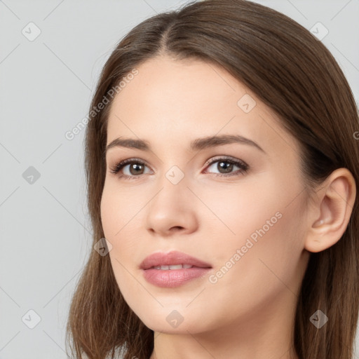 Neutral white young-adult female with long  brown hair and brown eyes