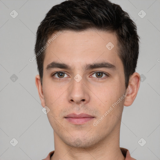 Neutral white young-adult male with short  brown hair and brown eyes